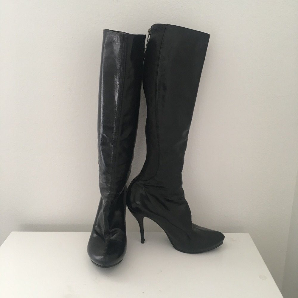 Alexander McQueen knee high spike heel boots
